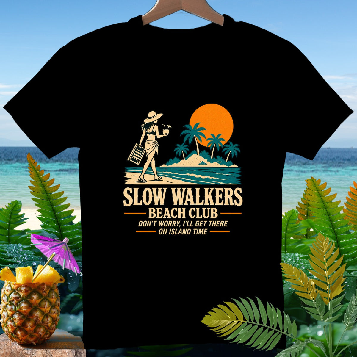 Black t-shirt with "Slow Walkers Beach Club" and beach graphic.