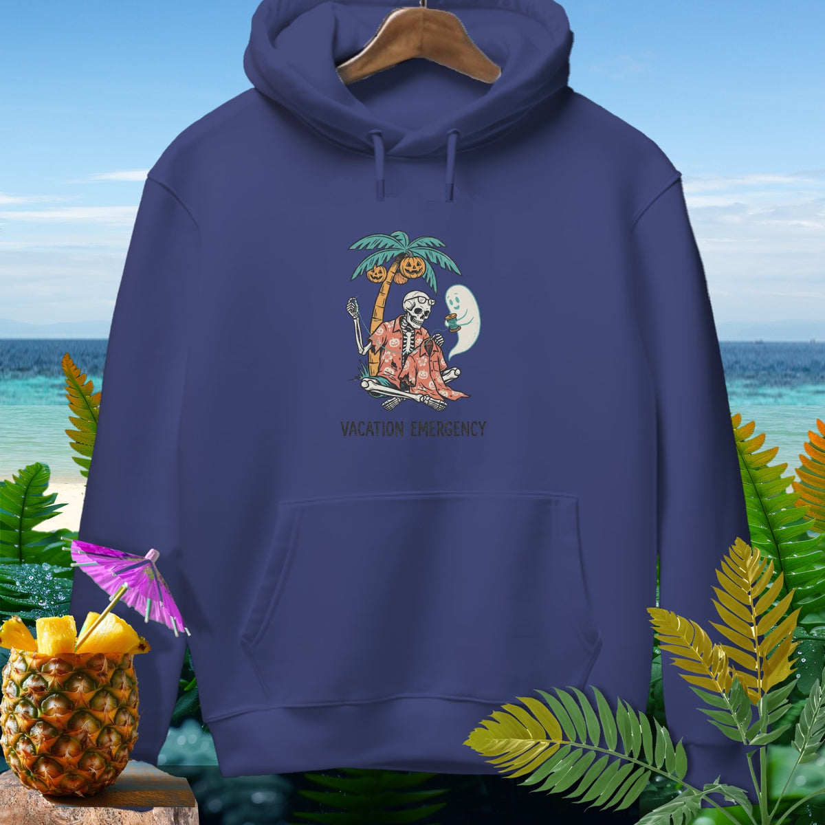 Navy hoodie with skeleton, ghost, and pumpkins under a palm tree graphic.