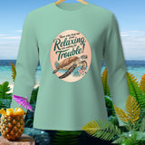 Mint long sleeve shirt with sea turtle graphic and text 