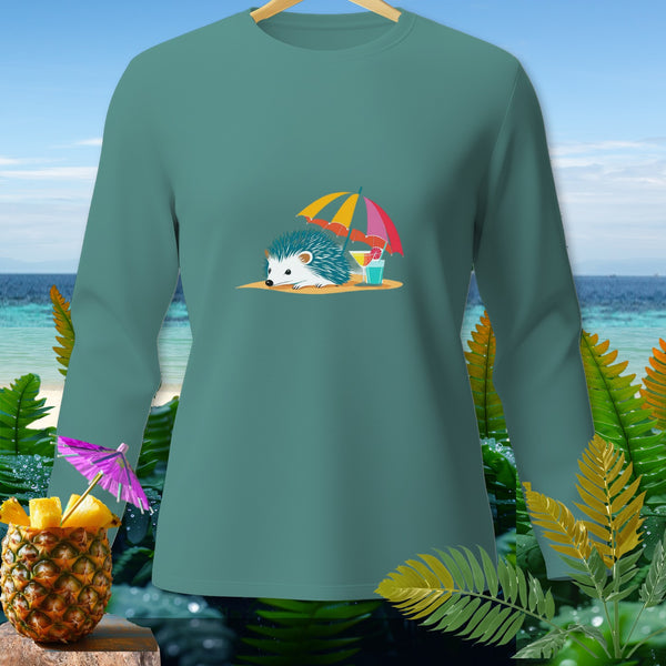 Teal long-sleeve shirt with a hedgehog, umbrella, and drink graphic on a beach background.