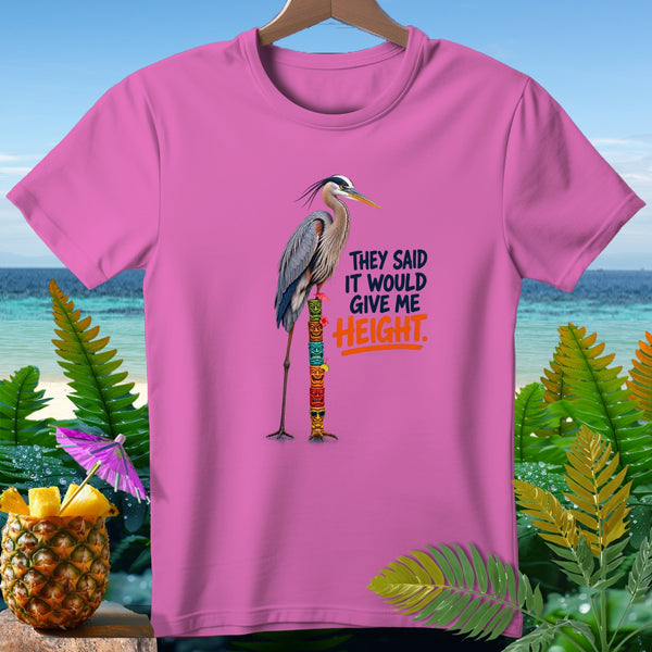 Pink t-shirt with a heron standing on a totem pole with text "THEY SAID IT WOULD GIVE ME HEIGHT".