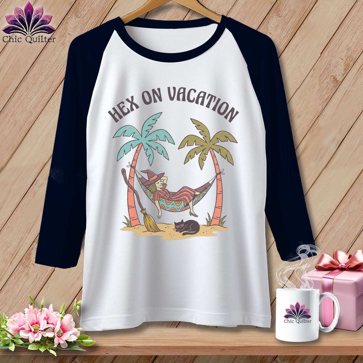 Raglan shirt with witch on hammock, palm trees, black cat, and broom text "Hex on Vacation".
