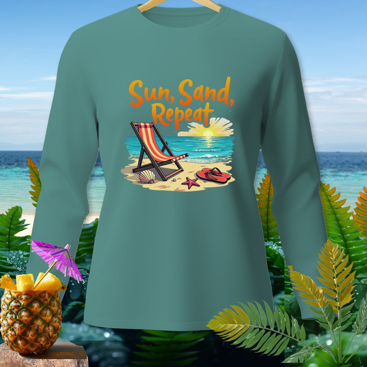 Long-sleeve shirt with "Sun, Sand, Repeat" beach graphic.