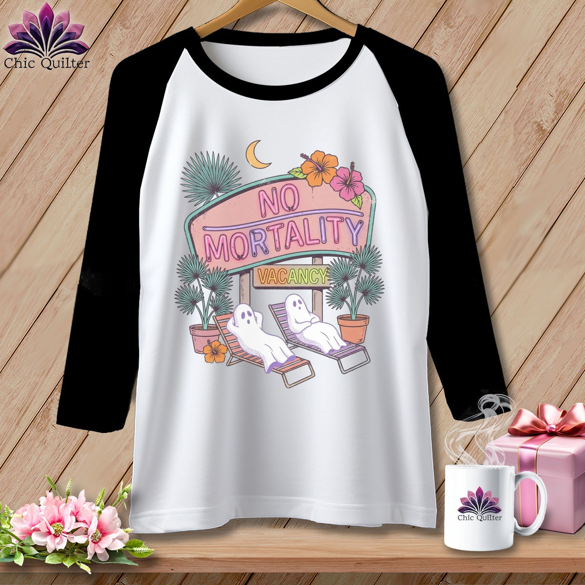 Raglan shirt with ghosts relaxing under a "No Mortality Vacancy" sign.