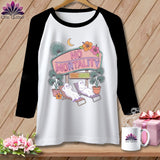 Raglan shirt with ghosts relaxing under a 