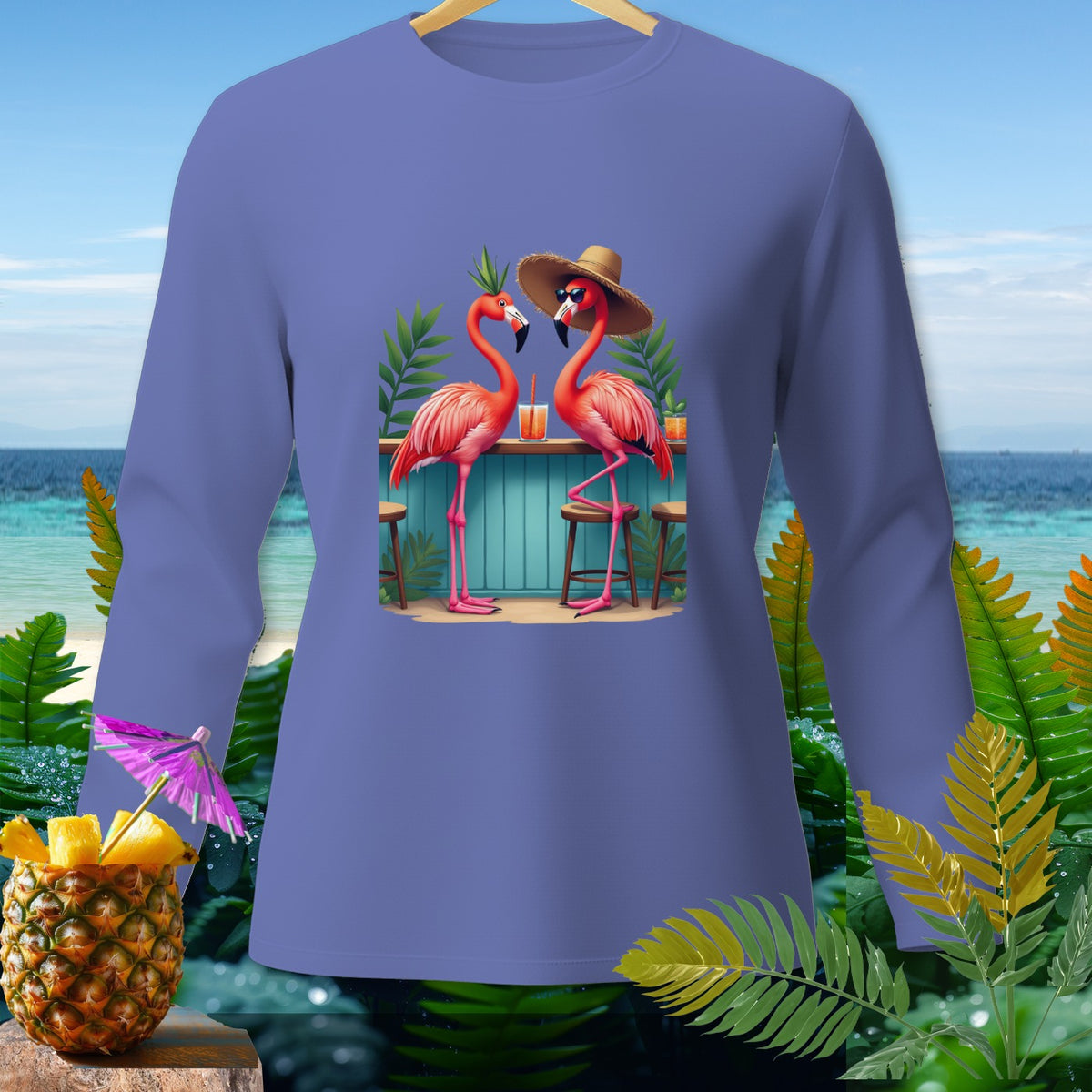 Long sleeve shirt with two flamingos at a bar in a tropical setting.