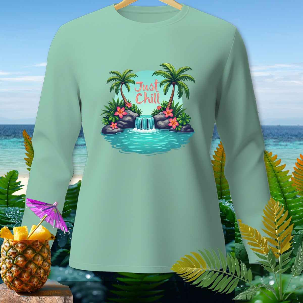 Light green long sleeve shirt with "Just Chill" text and tropical waterfall graphic.