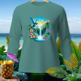 Teal long sleeve shirt with a tropical scene featuring a hummingbird and waterfall graphic.