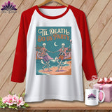 White baseball tee with a graphic of skeletons dancing on a beach with text 