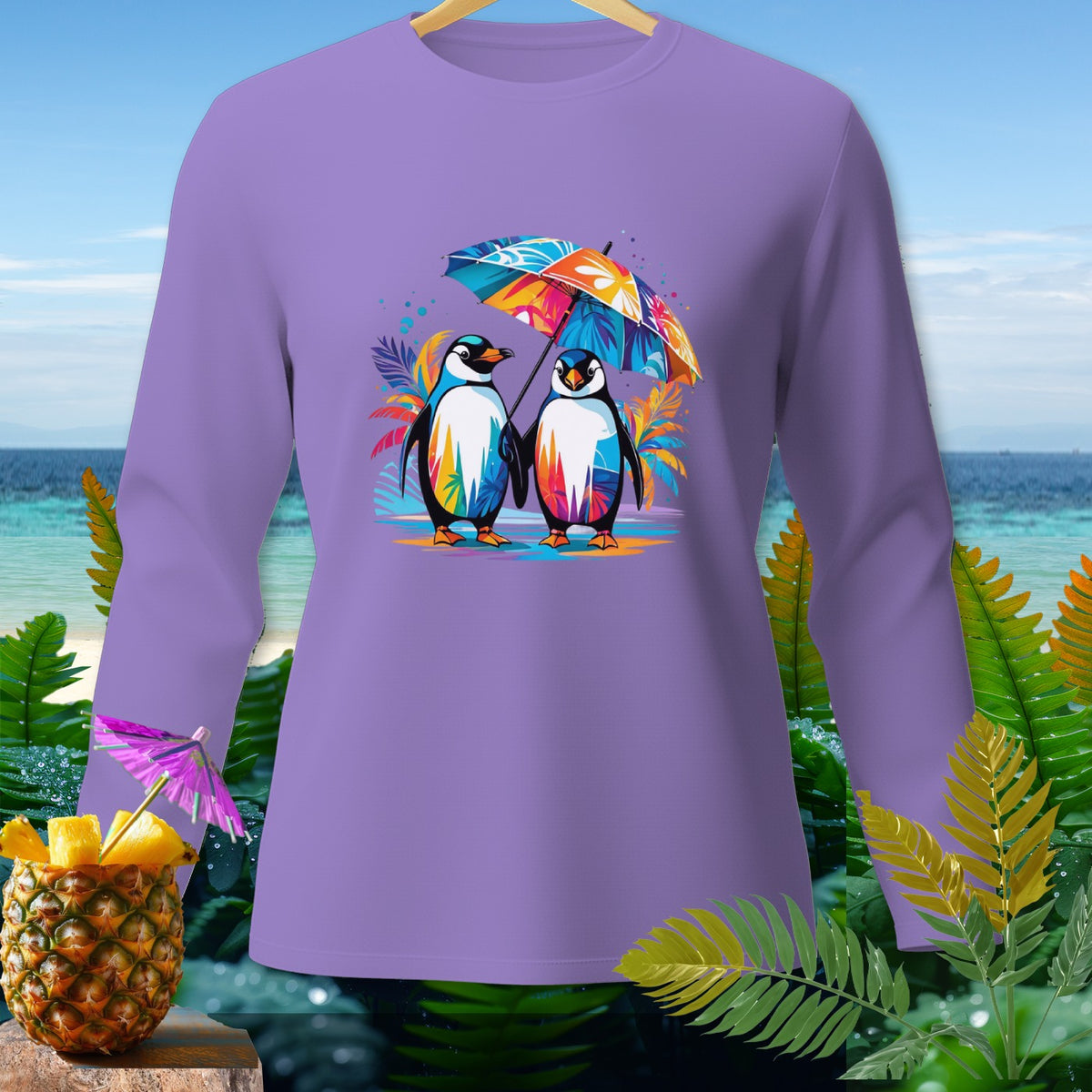 Purple long-sleeve shirt with two penguins sharing a colorful umbrella.