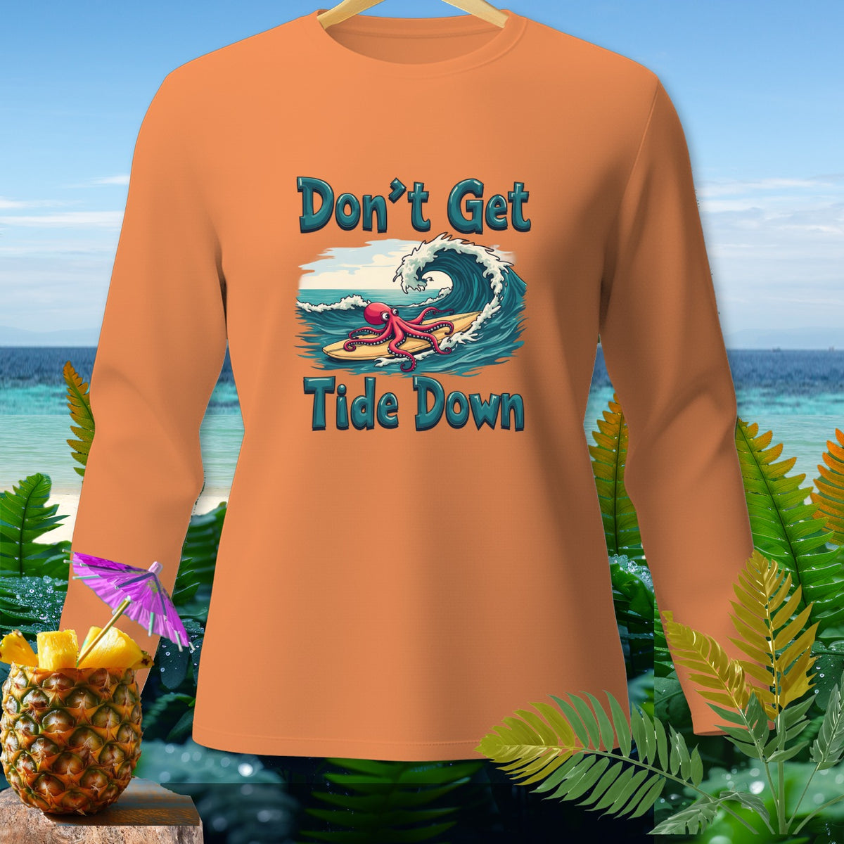 Orange long-sleeve shirt with "Don't Get Tide Down" and surfing octopus graphic.