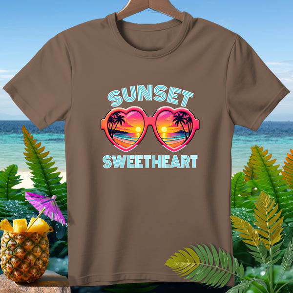 Brown t-shirt with "Sunset Sweetheart" text and heart-shaped sunglasses graphic.
