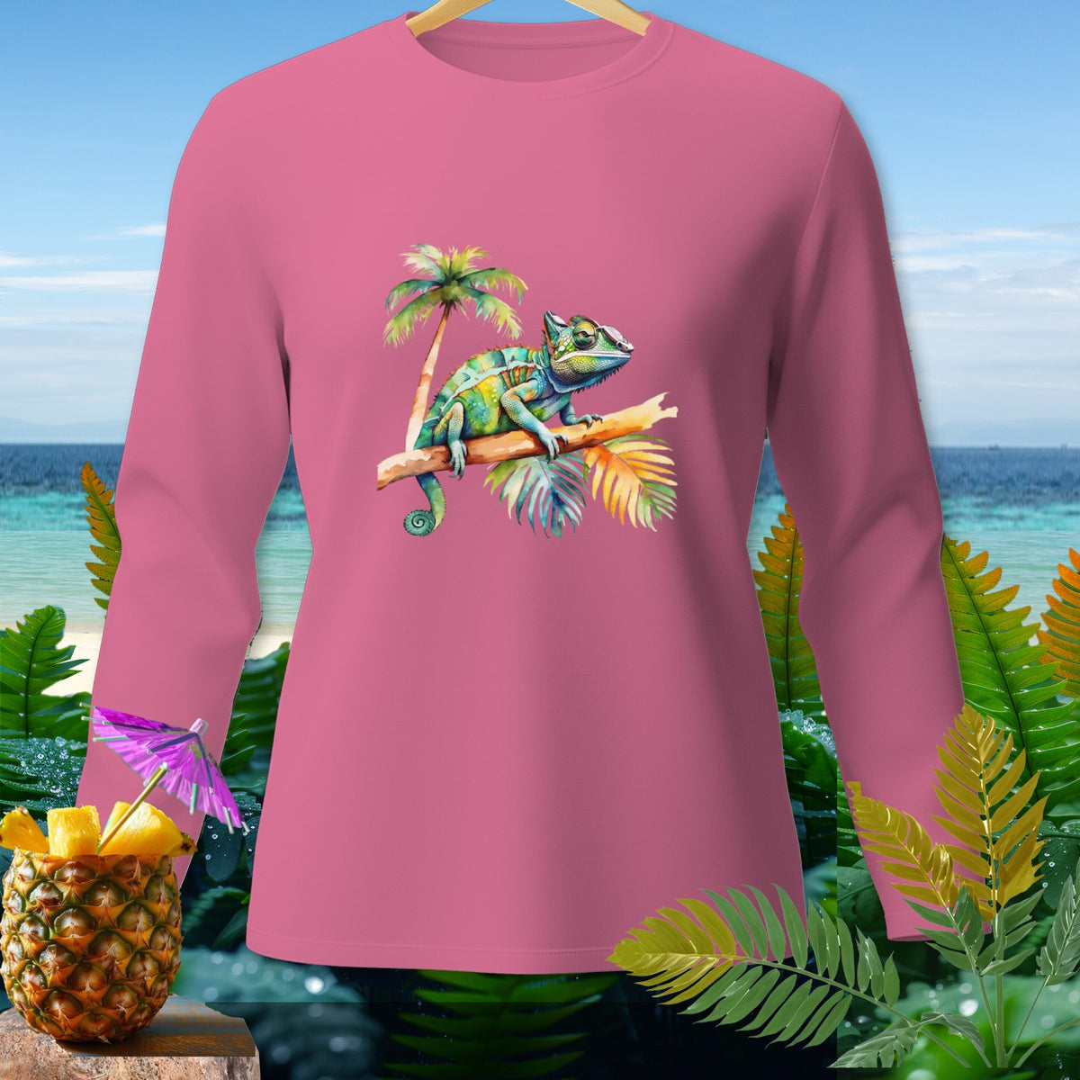 Pink long-sleeve shirt with a chameleon and palm tree graphic.
