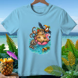 Light blue t-shirt with a cartoon of animals relaxing on a pink flamingo float in the ocean.