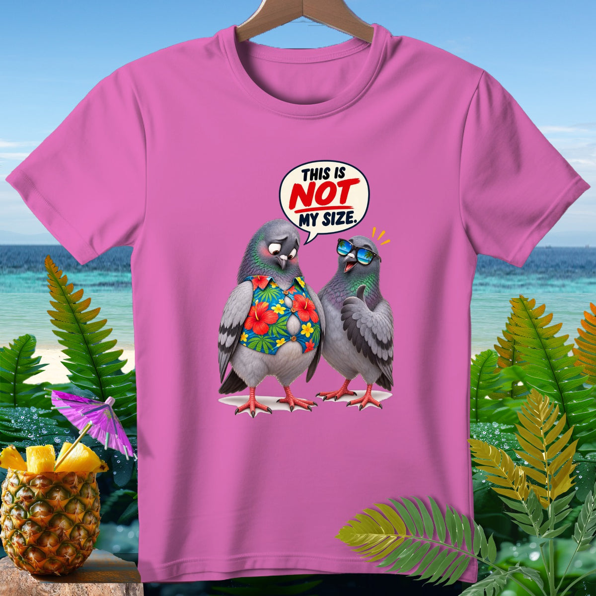 Pink t-shirt with two pigeons, one in a Hawaiian shirt, saying "This is not my size."