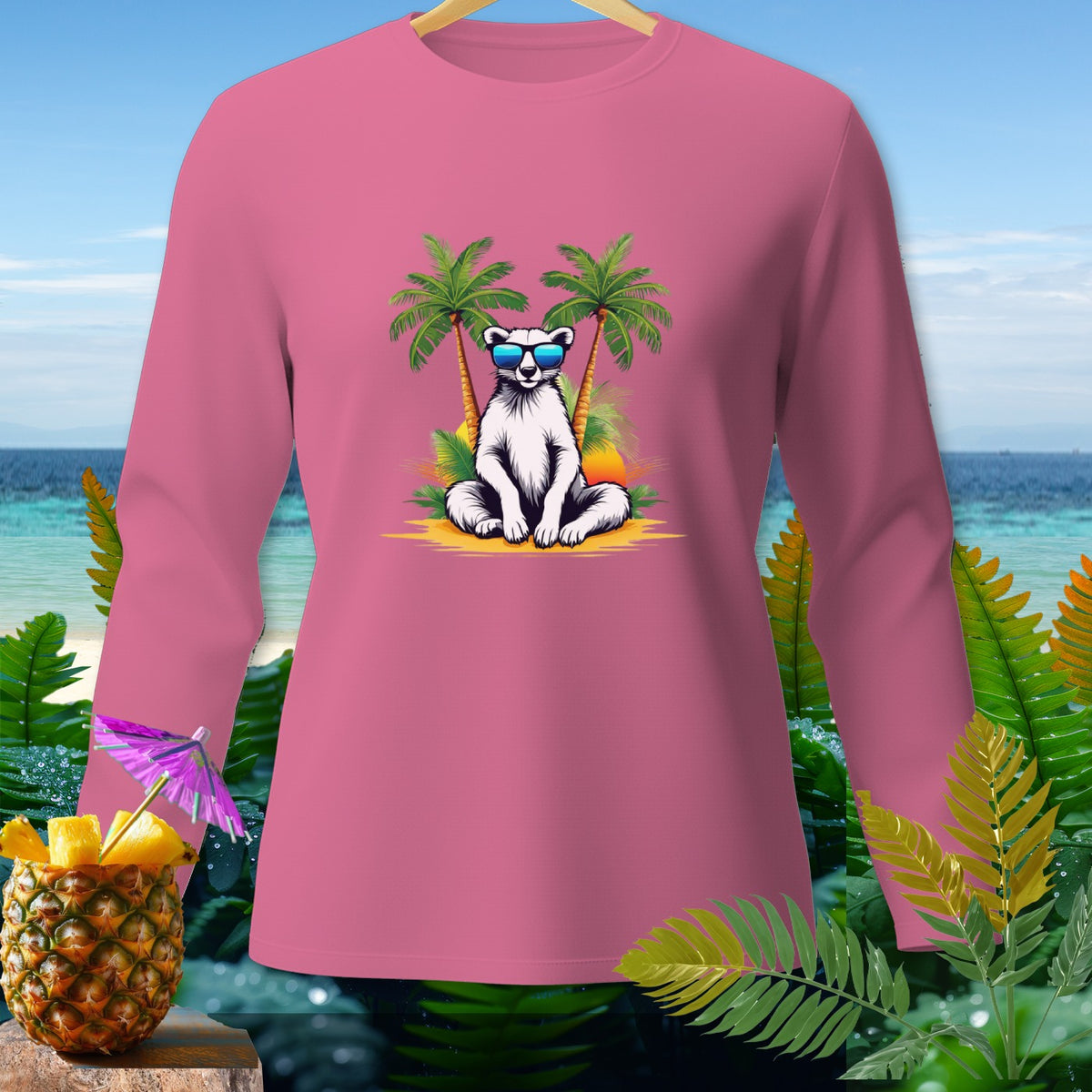 Pink long-sleeve shirt with a graphic of a polar bear wearing sunglasses on a beach.