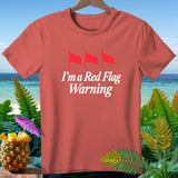 Coral t-shirt with three red flags and text 