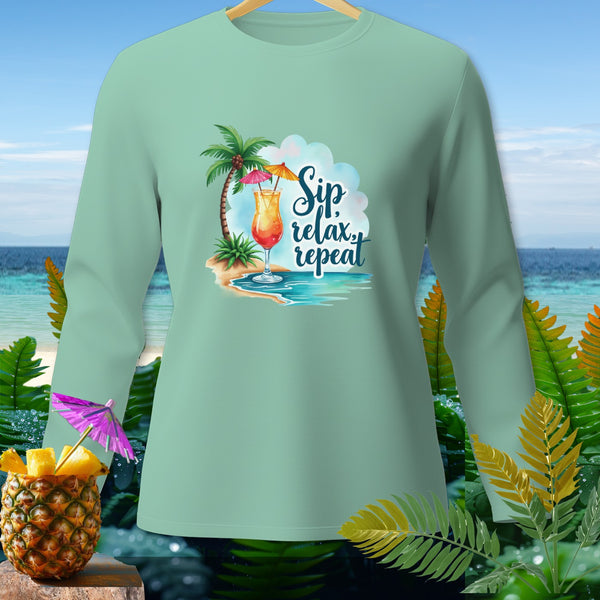 Light green long-sleeve shirt with "Sip, relax, repeat" graphic featuring a tropical drink.
