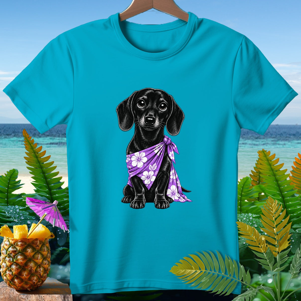 Turquoise t-shirt with black dachshund wearing a purple floral bandana.