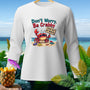 White long-sleeve shirt with a crab holding a "Stay Off My Beach" sign.