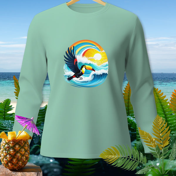 Light green long-sleeve shirt with toucan, waves, sun, and rainbow graphic.