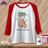 Skeleton, ghost, palm tree, and pumpkins graphic on a raglan t-shirt with 