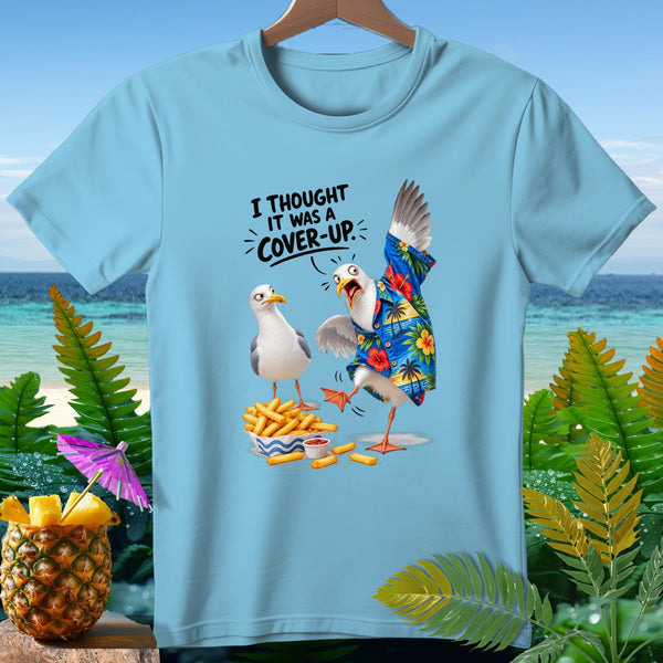 Light blue t-shirt with seagulls and text that reads "I thought it was a cover-up."