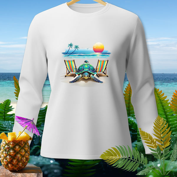 White long-sleeve shirt with a tropical beach scene featuring a turtle and lounge chairs.