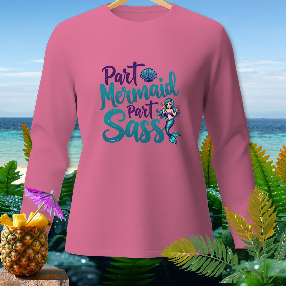 Pink long-sleeve shirt with "Part Mermaid Part Sass" text and mermaid graphic.