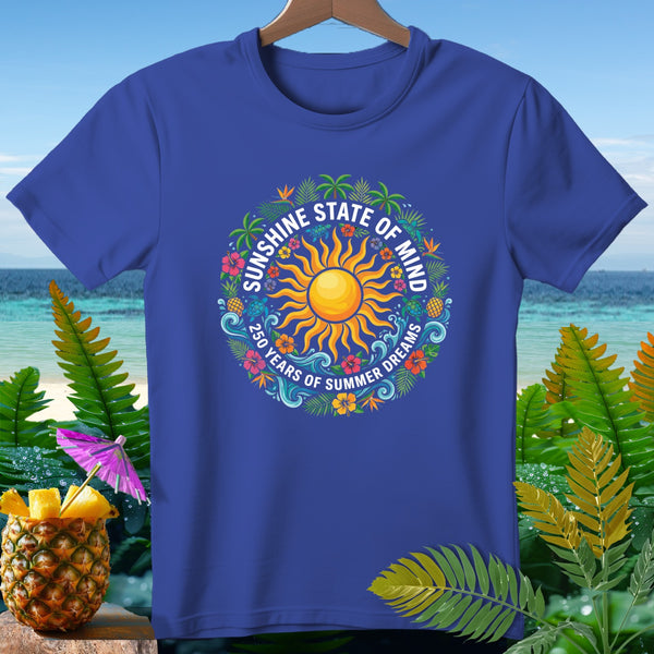 Blue t-shirt with a circular graphic of a sun and floral elements.