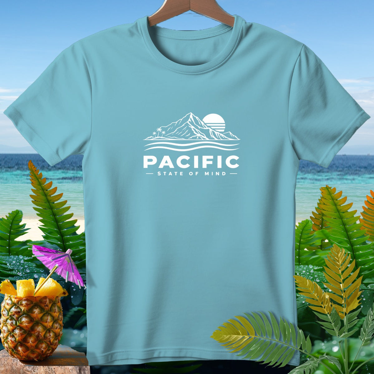 Light blue t-shirt with white "PACIFIC STATE OF MIND" graphic and tropical background.