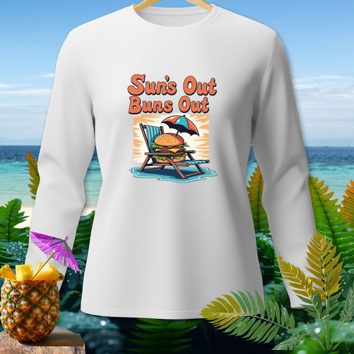 White long-sleeve shirt with "Sun's Out Buns Out" graphic and a burger on a beach chair.