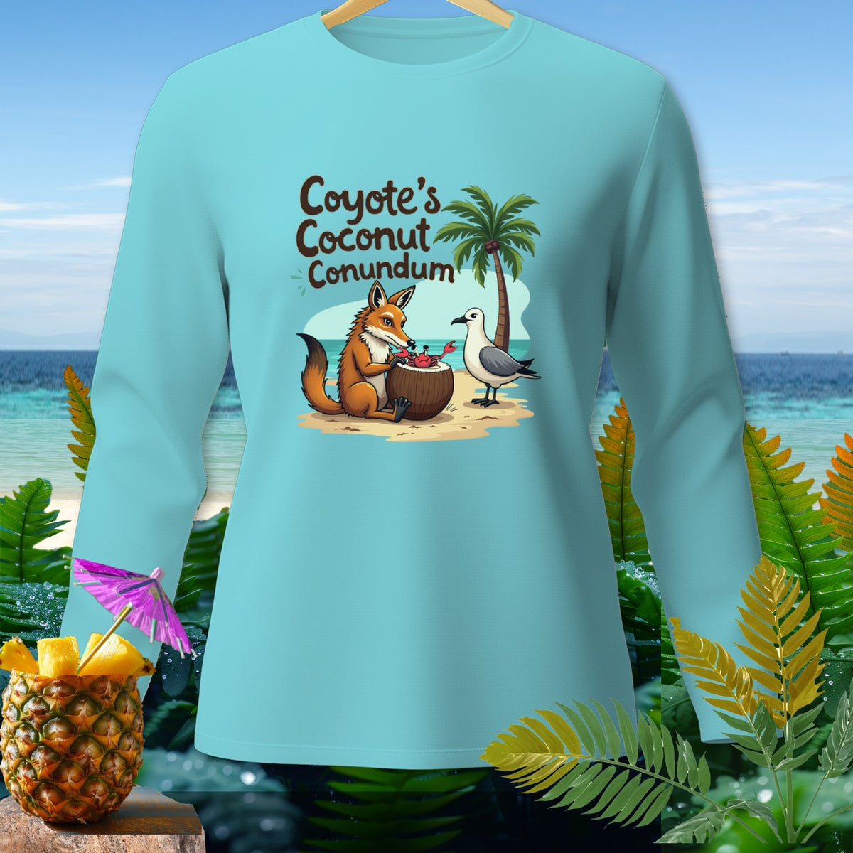 Light blue long-sleeve shirt with "Coyote's Coconut Conundrum" text and cartoon.