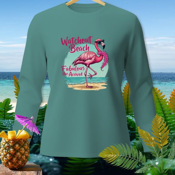 Teal long sleeve shirt with a flamingo graphic that reads "Watchout Beach Fabulous Has Arrived".