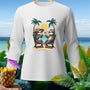 White long-sleeve shirt with two sloths relaxing on a beach with drinks.