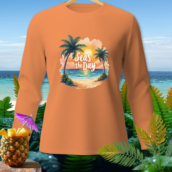 Orange long-sleeve shirt with "Seas the Day" beach graphic and pineapple drink.