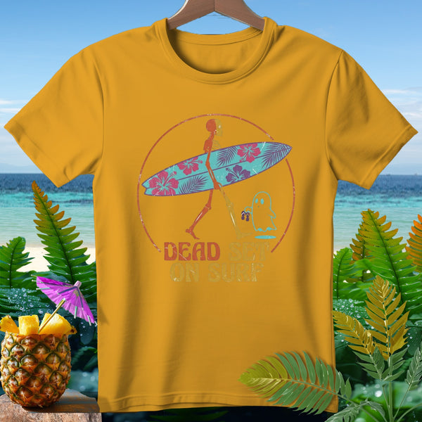 Skeleton and ghost holding a surfboard with "DEAD SET ON SURF" text.