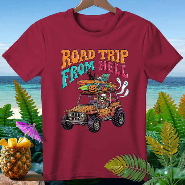 T-shirt graphic with skeleton in jeep, pumpkins, surfboards, and "Road Trip From Hell" text.