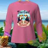 Pink long-sleeve shirt with toucans, beach, and text 