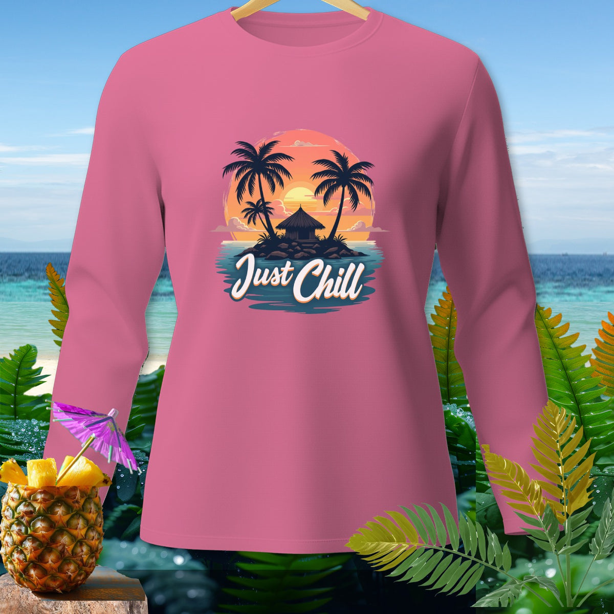 Pink long-sleeve shirt with a tropical island graphic and "Just Chill" text.