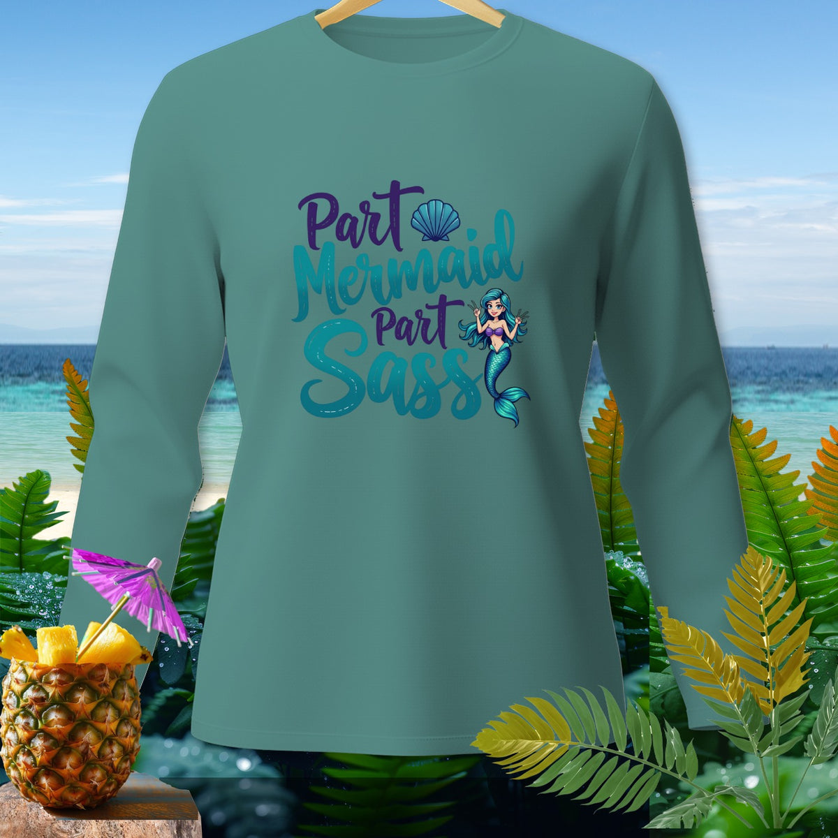 Teal long-sleeve shirt with "Part Mermaid Part Sass" text and mermaid graphic.