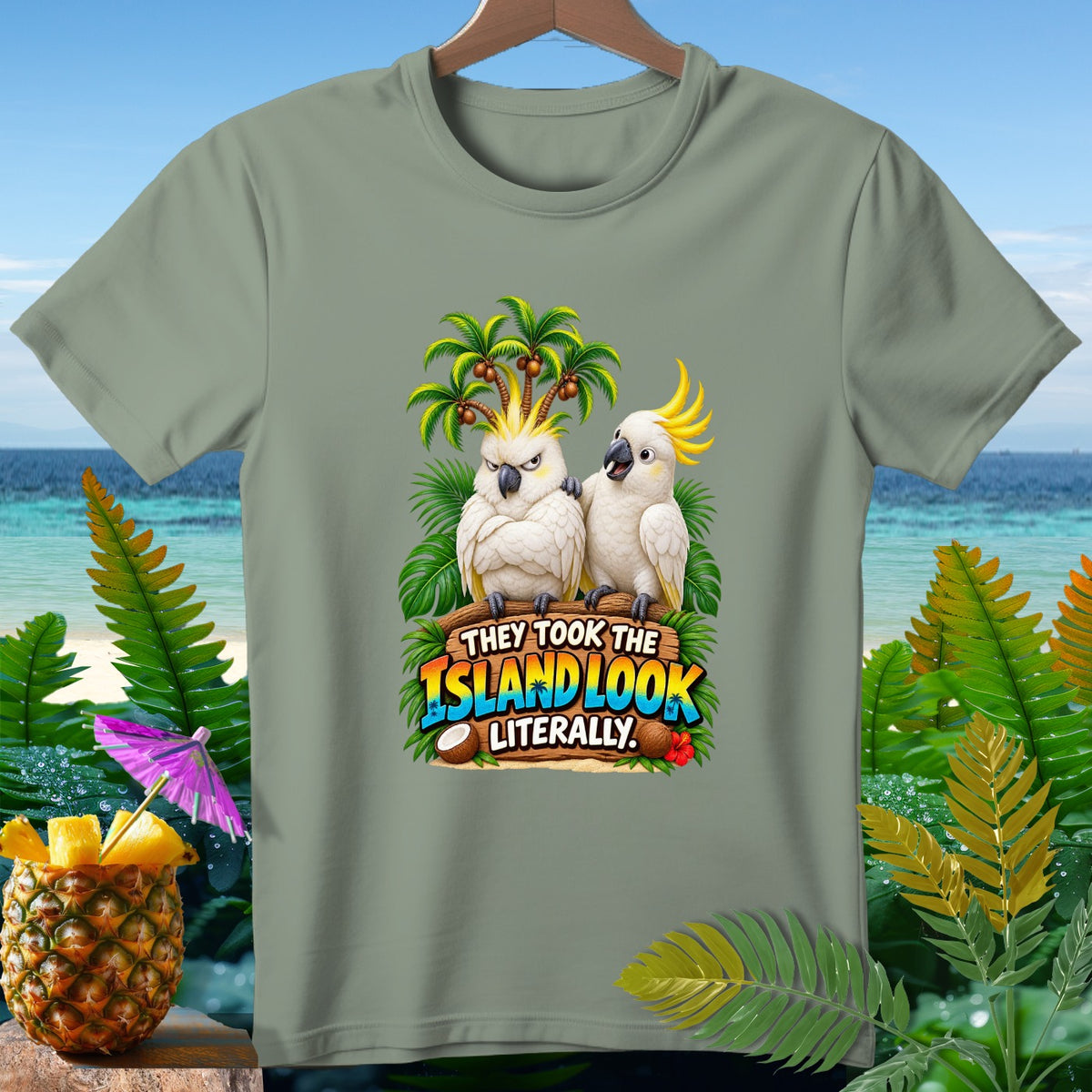Two cockatoos on a sign that reads "They Took The Island Look Literally".