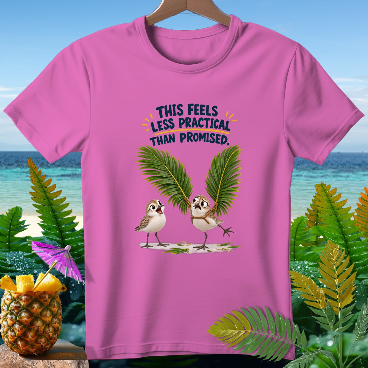 Pink t-shirt with birds and text "THIS FEELS LESS PRACTICAL THAN PROMISED."