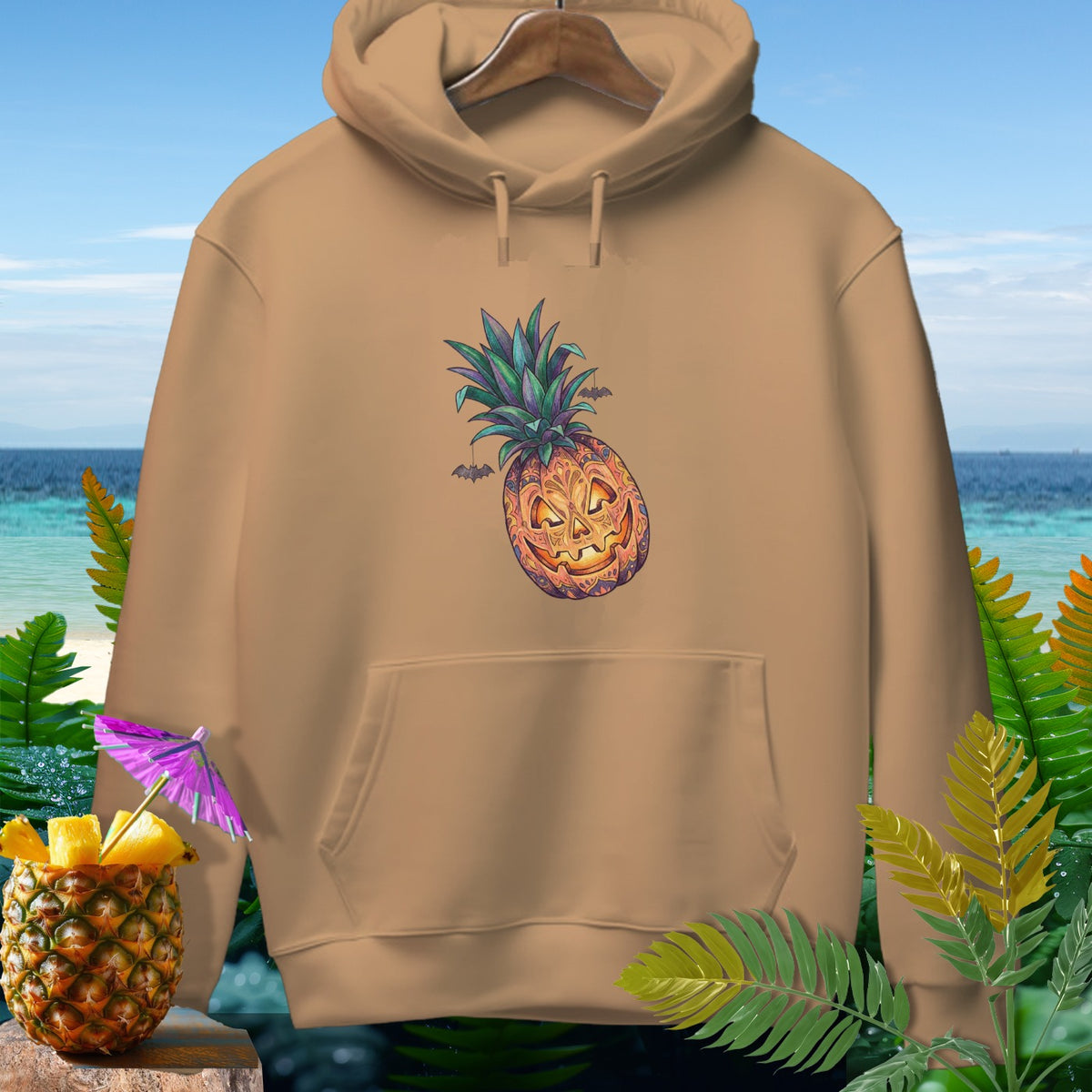 Brown hoodie with a jack-o'-lantern pineapple graphic and palm leaves.