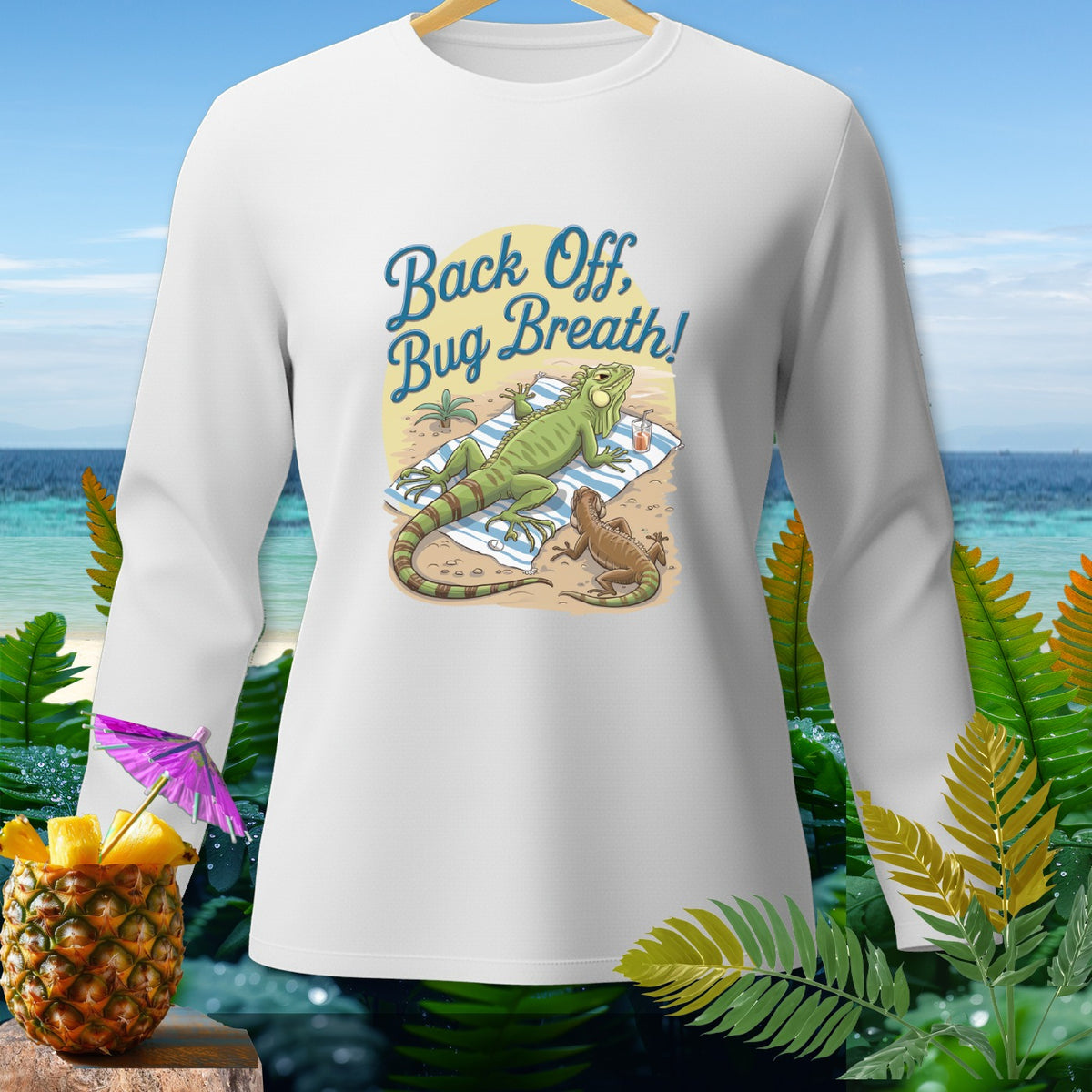 White long-sleeve shirt with iguanas on a beach and text "Back Off, Bug Breath!"