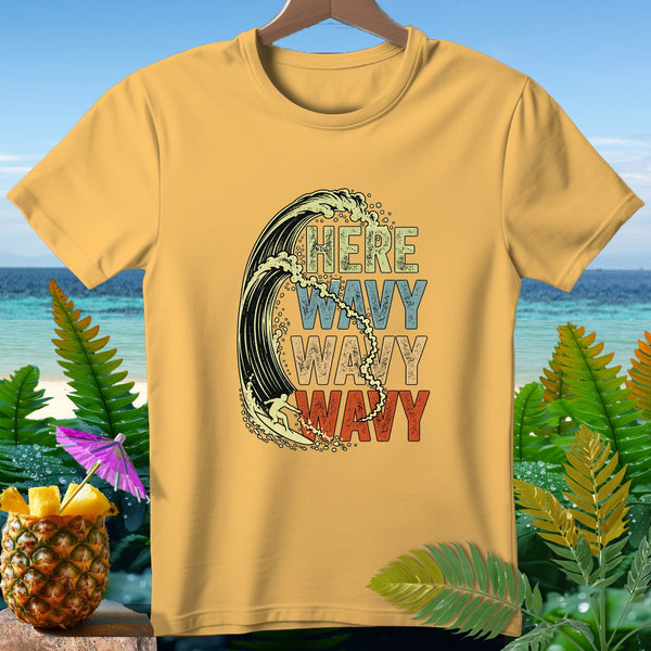 Yellow t-shirt with vintage graphic of a surfer on a wave and text "HERE WAVY WAVY WAVY".