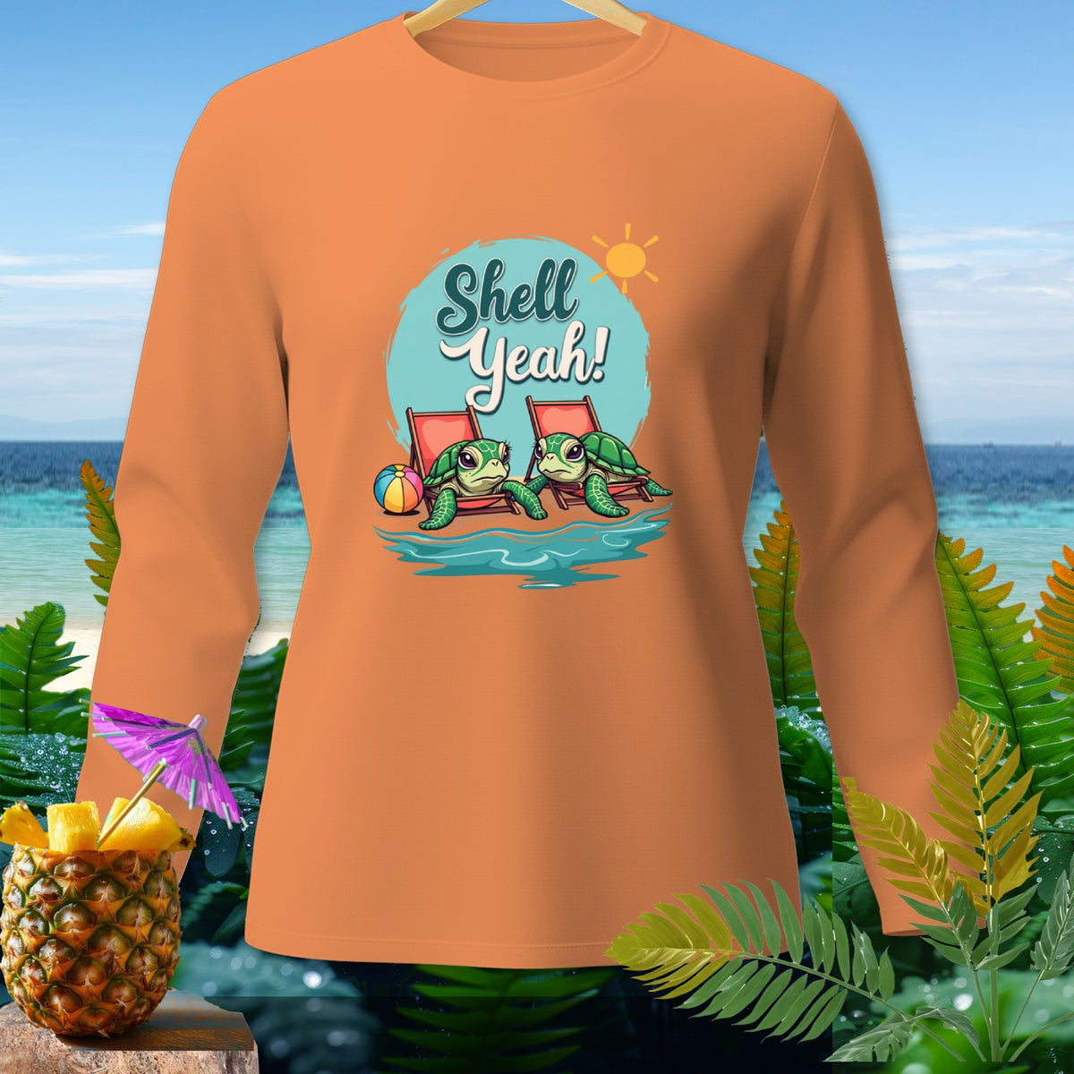 Orange long-sleeve shirt with cartoon turtles lounging and "Shell Yeah!" text.