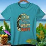 Teal t-shirt with graphic of surfer in wave and text 