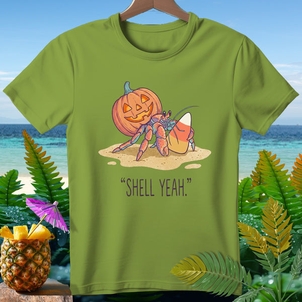 Hermit crab with pumpkin shell and candy corn, text "SHELL YEAH."