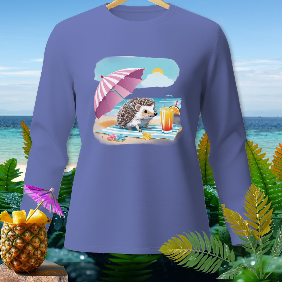 Long sleeve purple shirt with a cartoon hedgehog under a pink umbrella on a beach.